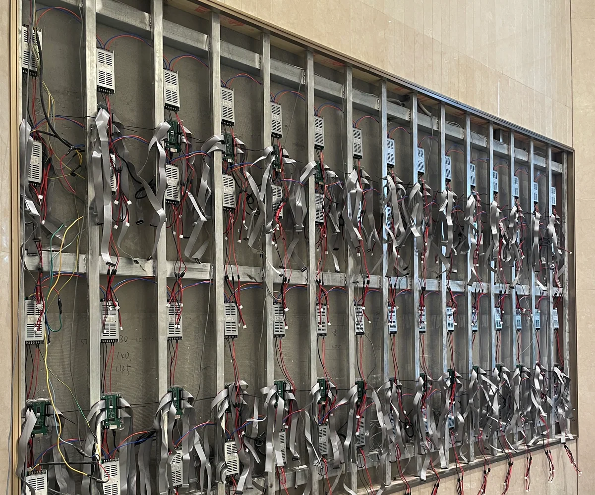 Power and signal wiring exposed during LED display service work